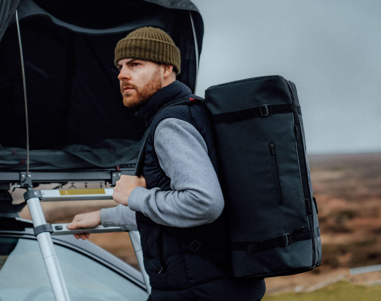 Photographer Tom Kahler with GRID Duffel Backpack