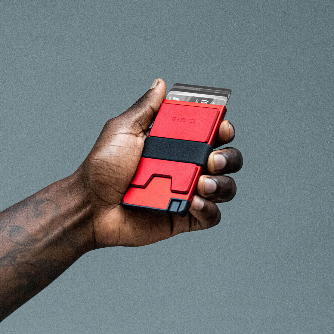 Ergonomic front pocket wallet in fiery red