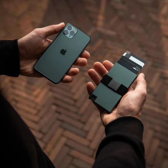 Aluminum Cardholder held in held next to matching iPhone