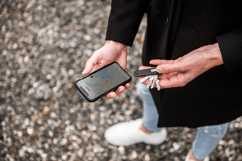 key holder in use with tracker app showcase functionality