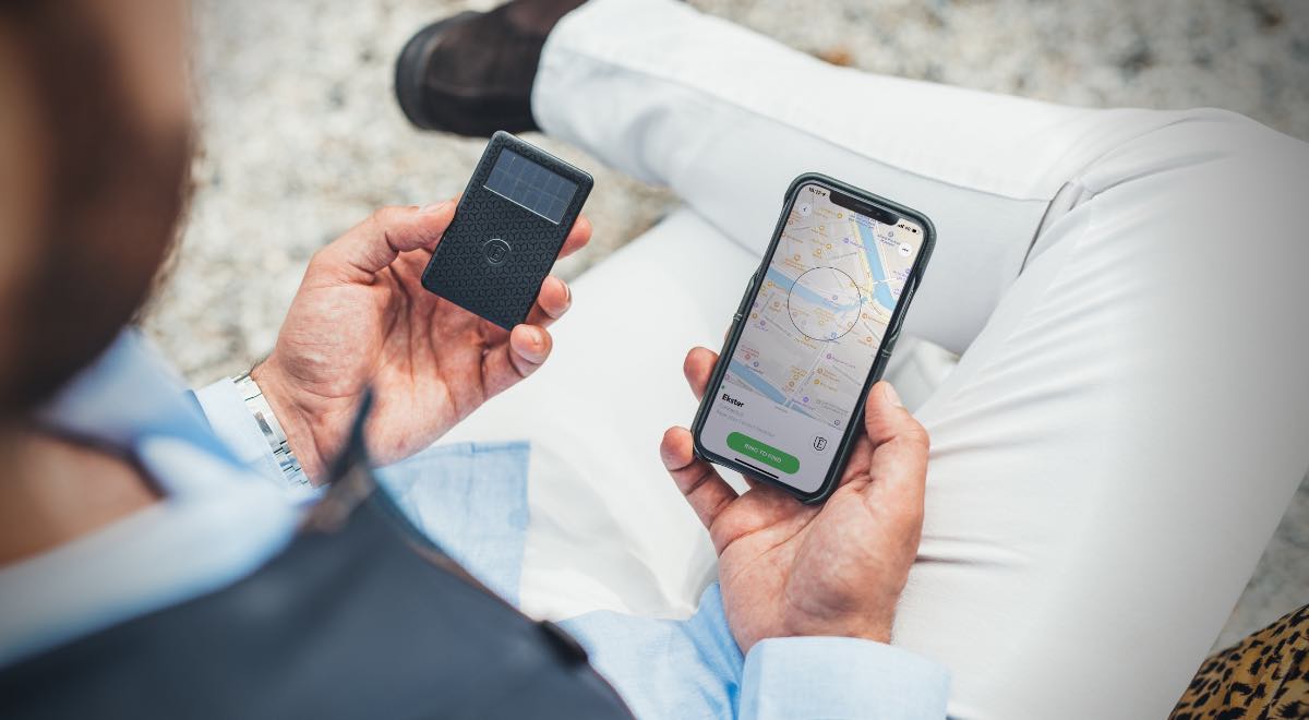 Person tracking solar powered tracker card with iPhone app