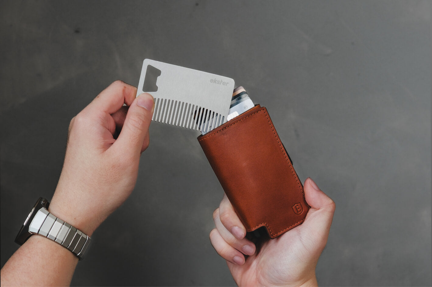 Comb and bottle opener card in wallet