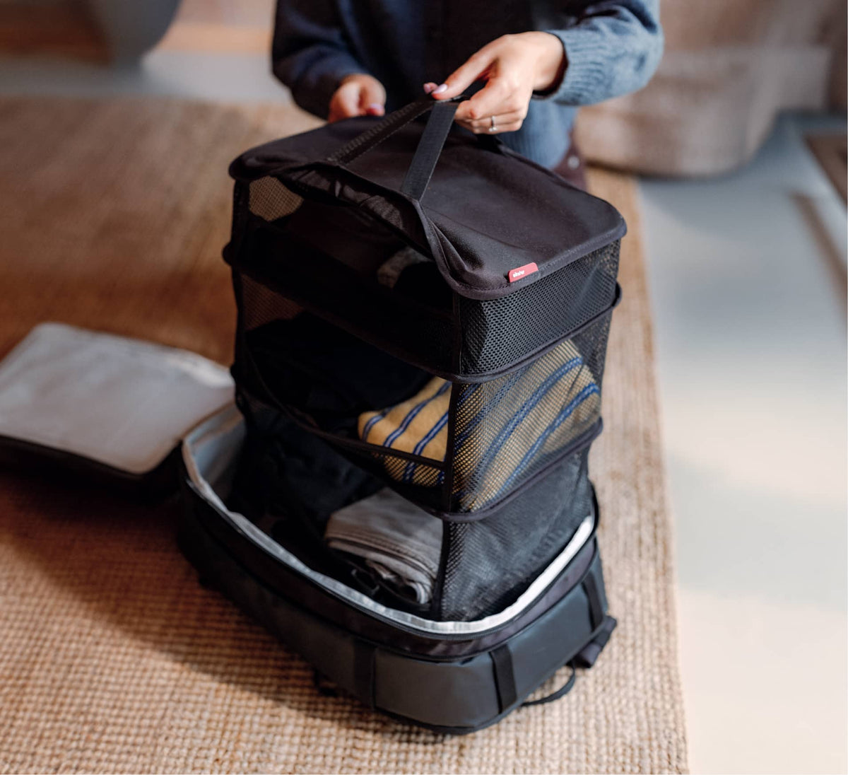Hanging garment organizer for backpack